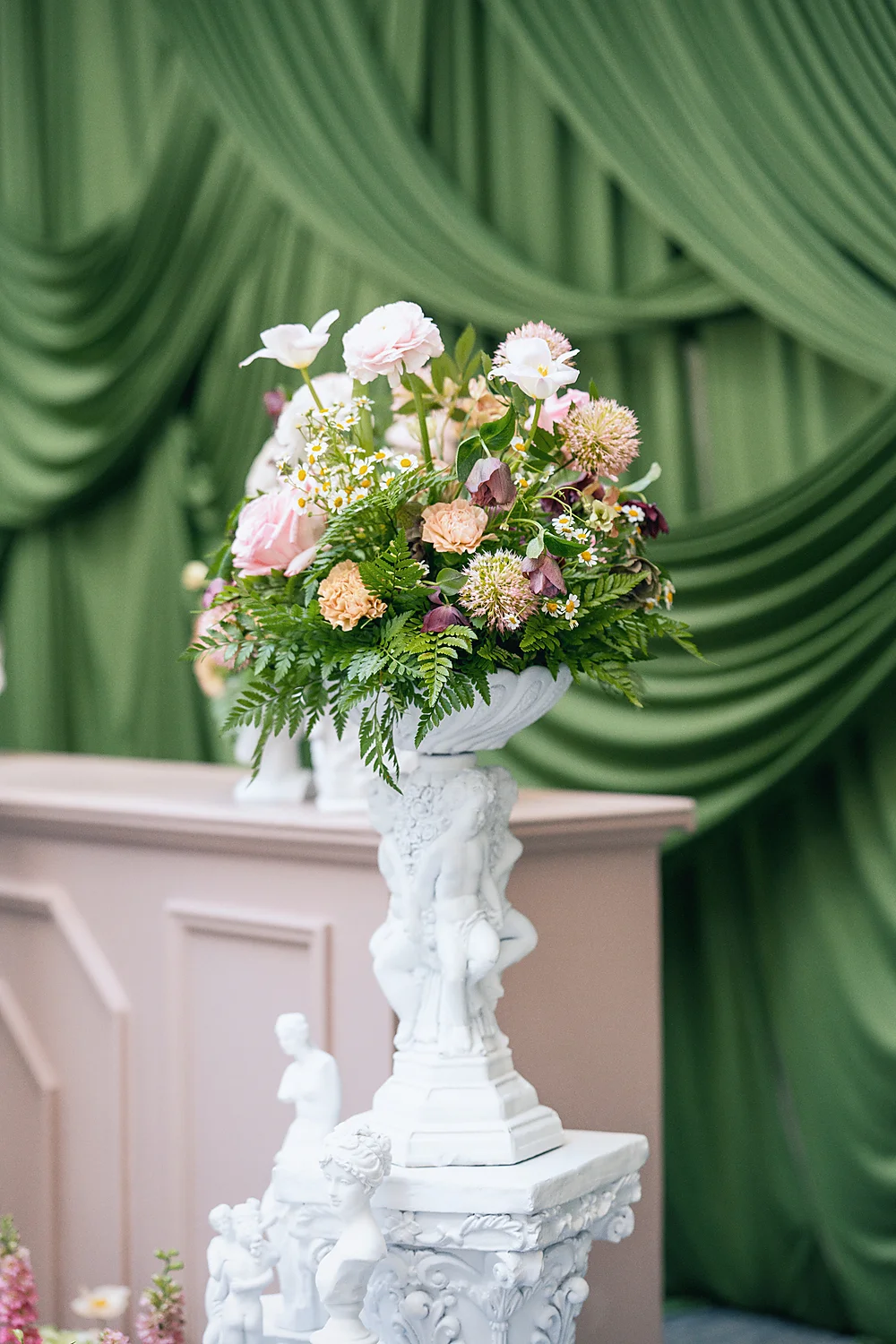 Stunning Brilliant Events Designs The Joule Trendsetter Series Dallas Tx floral arrangement classical statues green drapes