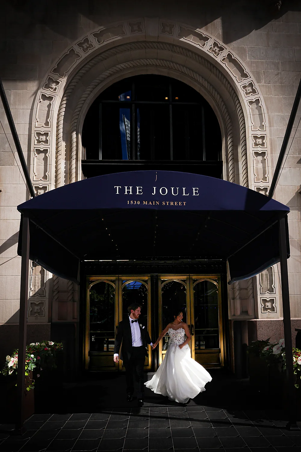 Stunning Brilliant Events Designs The Joule Trendsetter Series Dallas Tx newlyweds leaving luxury hotel (1)