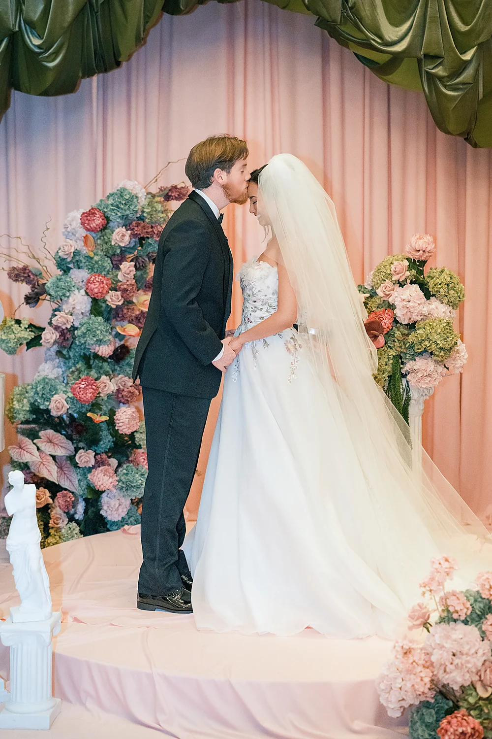 Stunning Brilliant Events Designs The Joule Trendsetter Series Dallas Tx romantic wedding couple kiss