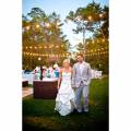 Alys Beach string light reception bride groom