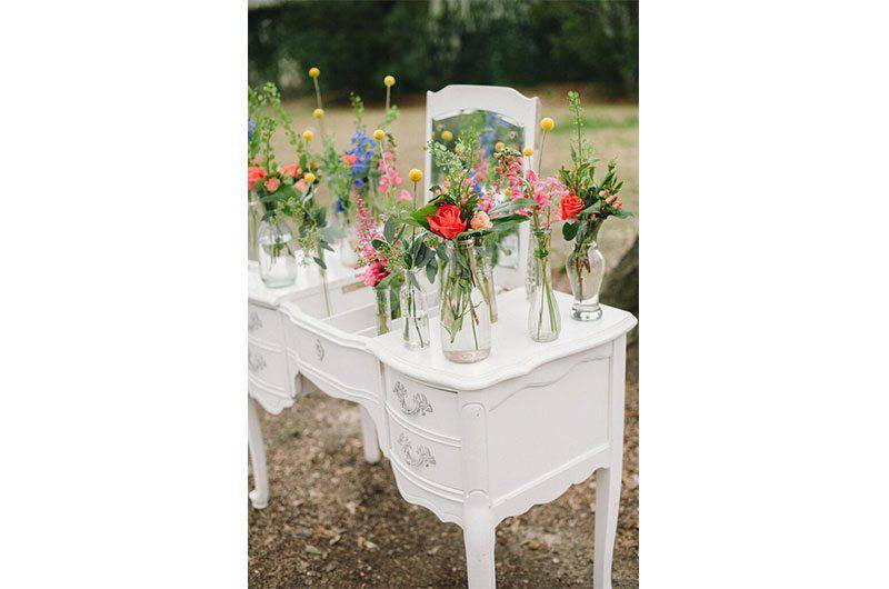Signature Occasions vanity dresser small flower bouquets in glass vases