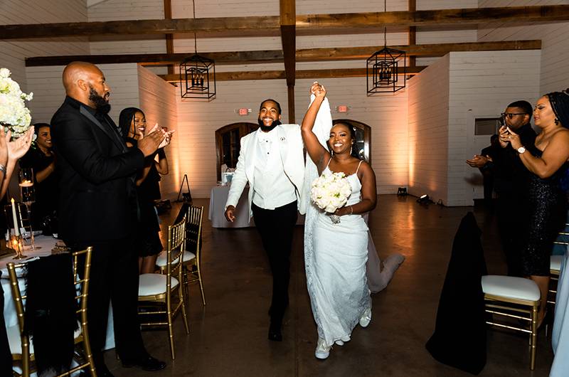 Tammara Chamberlain And Jarrett Webster Couple Walk In Reception