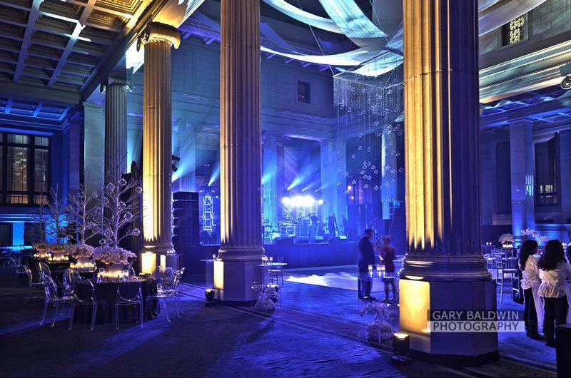 The Columns at One Commerce Square Blue and yellow lighting lice concert on stage