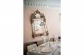 Broussards Restaurant and Courtyard Indoor Dining Room Ornamental Mirror