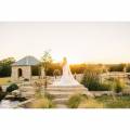 Hidden River Ranch Weddings & Events Bride Outside During Sunset