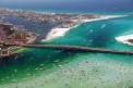 Emerald Coast Convention and Visitors Bureau Balcony view of boats and bridge