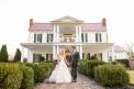 Outside Of Heartwood Hall Venue Bride and Groom holding hands