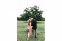 Ashlye McCormick Design bride and groom couple together in field