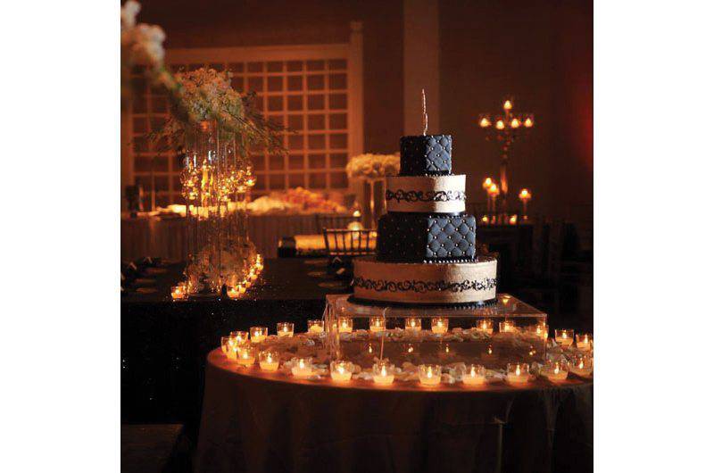 Weddings by Lulu Dim lit Wedding reception tiered wedding cake