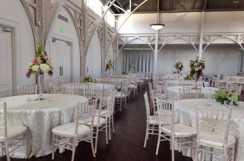 The Atrium silver reception seating round tables
