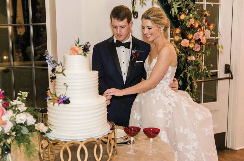 Sadie Batson And Eric Storey Real Wedding Cutting Cake