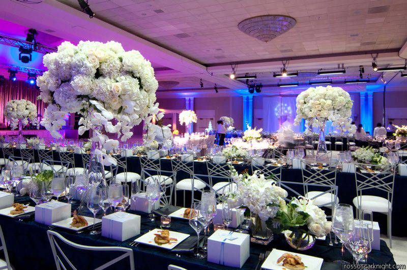 Southern Event Planners lighted reception white rose flower arrangements