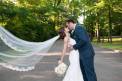 The Great Hall and Conference Center couple kiss flowing veil