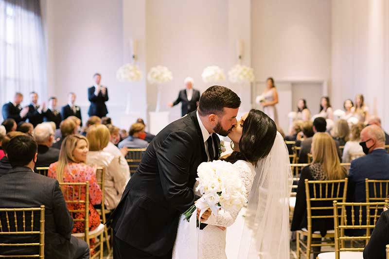 Tiffany Frangopoulos & Tyler Barnes Wed At A Timeless North Carolina Hotel Bride And Groom Kissing (1)