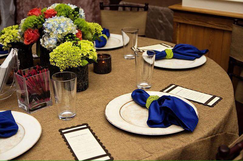 Elegant Chair Solutions table setting blue hand napkins linens  menu cards