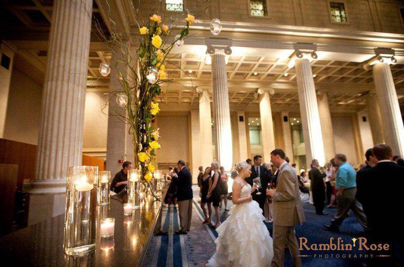 The Columns at One Commerce Square venue 2 Tall yellow flower centerpiece