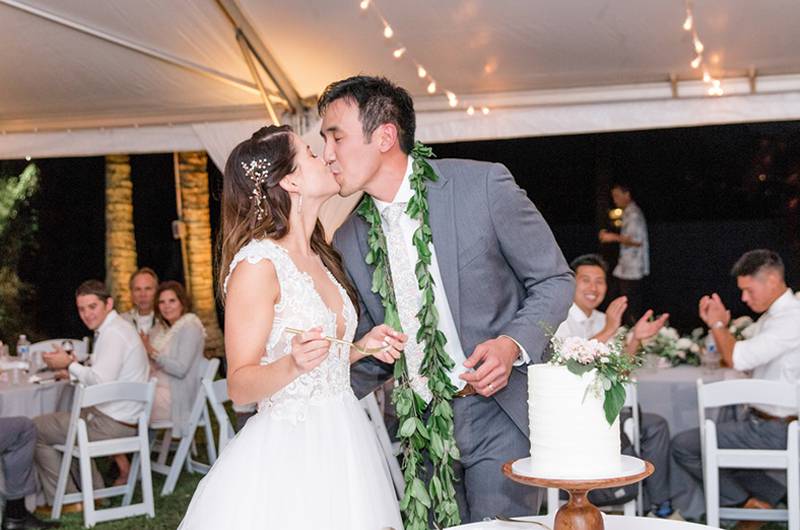 Lauren Miller And Matthew Yen Bride And Groom Kissing Cutting Cake