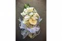 Holliday Flowers and events White flowers wrapped in glitter lace arrangement