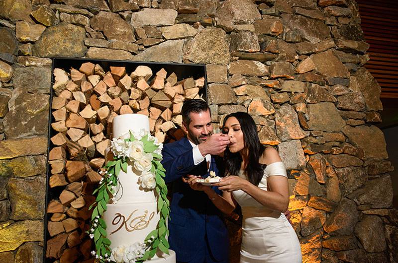 Kristal Caron & Stephen Meyer Couple Eating Wedding Cake