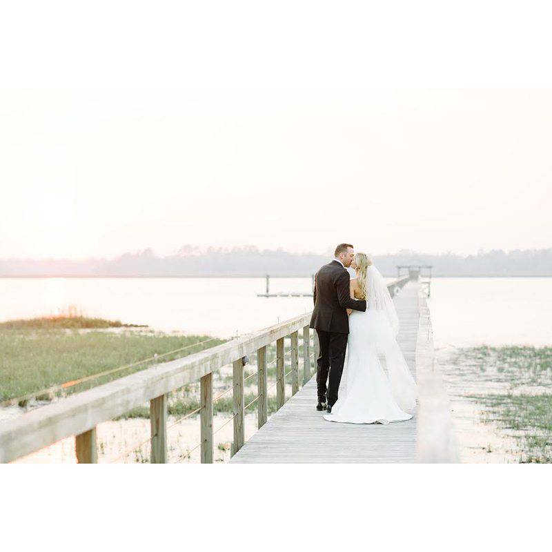Cervone Real Wedding Couple Kissing On Pier