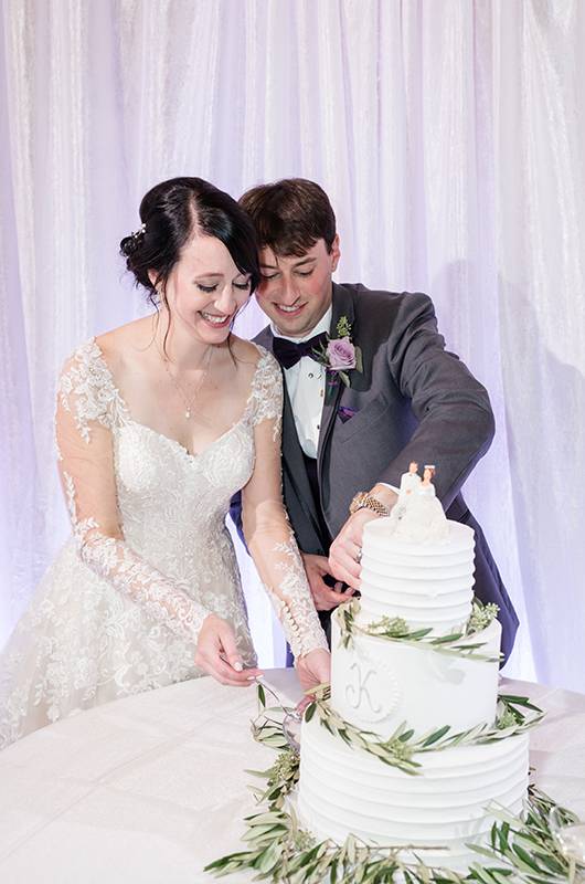 Christina Ridley And Barney Katzerman Cutting Cake