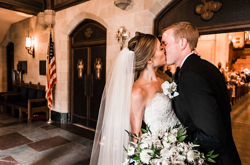 Kathryn Leona And Justin Stewart Cox Bride And Groom Kiss Outside Of Chapel