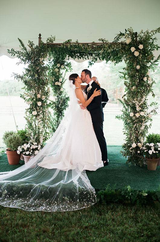 Madeleine Macks And Michael Fazzinos Real Wedding In Baltimore Maryland Bride And Groom Kissing At The Ceremony