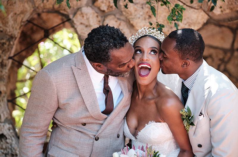 Arielle Clay & Steve Potea Father Of The Bride And Groom Kissing On Cheek