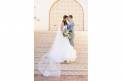 Shindigs by Sheril stairs bride groom together bouquet long wedding veil