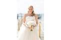 The Barefoot Bride strapless wedding dress bride holding bouquet