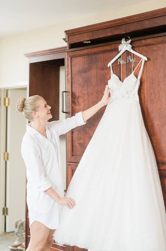 Kate Dipasquale & Chas Mye Bride Admiring Wedding Dress