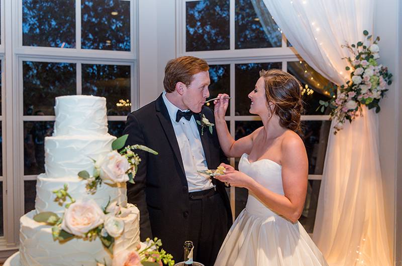 Callie And Gil Hanahan Bride And Groom Eating Wedding Cake Together