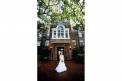 Historic Rice Mill outdoor bride with bouquet under trees
