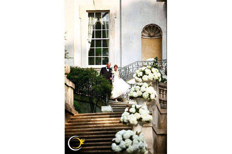 Andy Beach and Co father of the bride down venue stairs