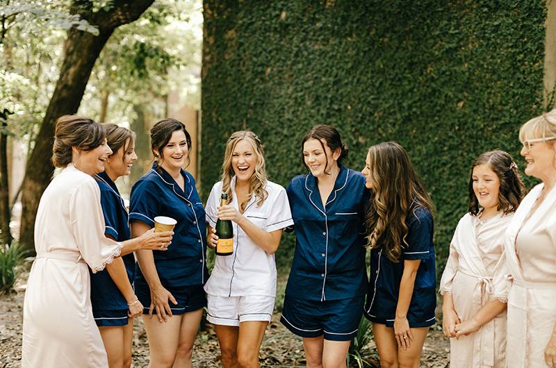 Brittany Knox And Tom Mueller Bridesmaids Popping Champagne