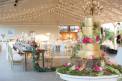 fete nashville reception wedding cake gold with bright magenta roses covered reception