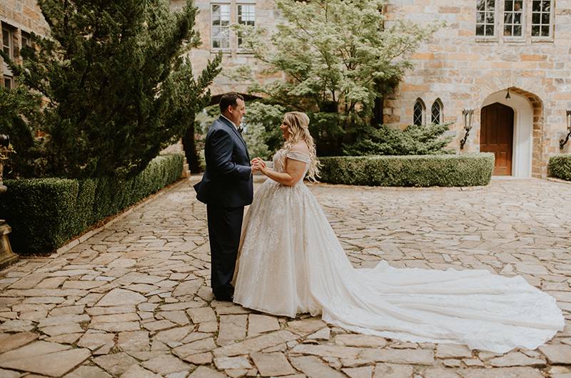 Amanda White And Steve McCorkle Couple Holding Hands