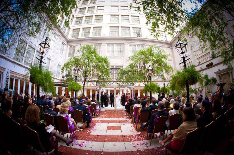Kelly Sherlock LLC wedding ceremony outdoor courtyard