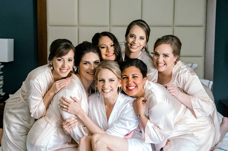 Christina Herubin And Afnajjer Hernandez Bride And Bridesmaids Group Hug On Bed