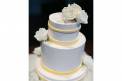 Signature Occasions small cake tiered wedding cake with white rose on top