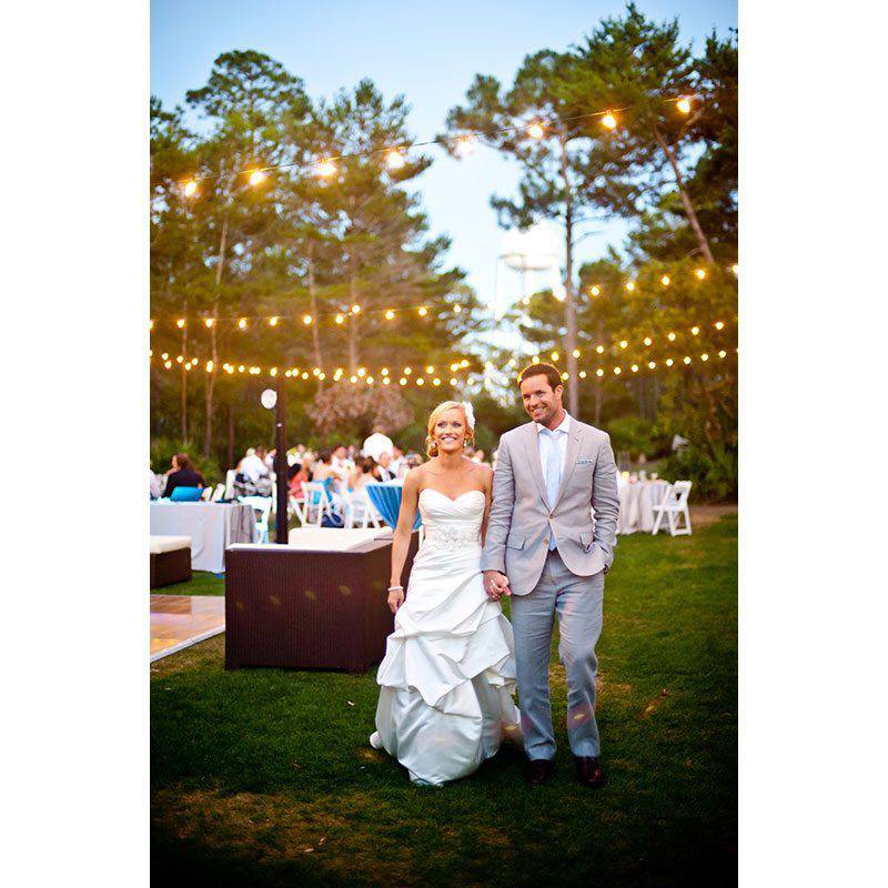 Alys Beach string light reception bride groom