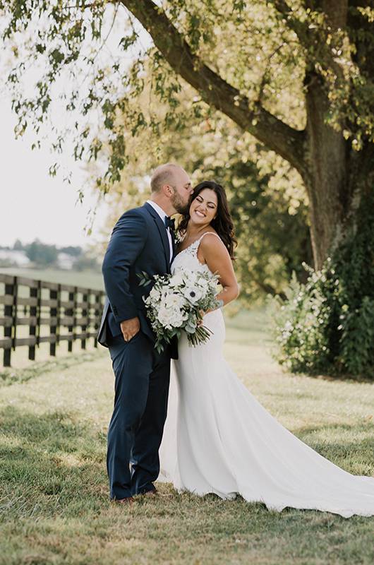 Tina Shtayyeh And Geno Tartell Bride And Groom Portrait Groom Kissing Bride