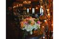 Holliday Flowers and events wedding bouquet centerpiece string light venue