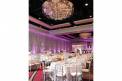 Weddings by Lulu ballroom reception hall chandelier round tables silver chairs