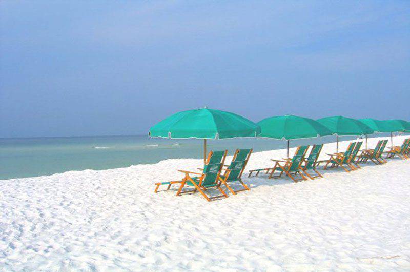 Emerald Coast Convention and Visitors Bureau Chairs on beach