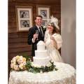 Gracelands Chapel In The Woods Bride And Groom With Wedding Cake