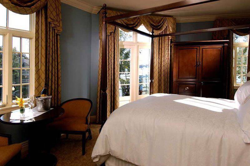 River Inn of Harbor Town King room with curtains and tall windows