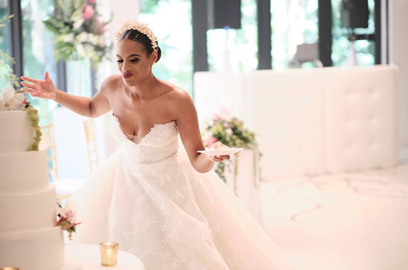 Arielle Clay & Steve Potea Bride Smiling Looking At Wedding Cake