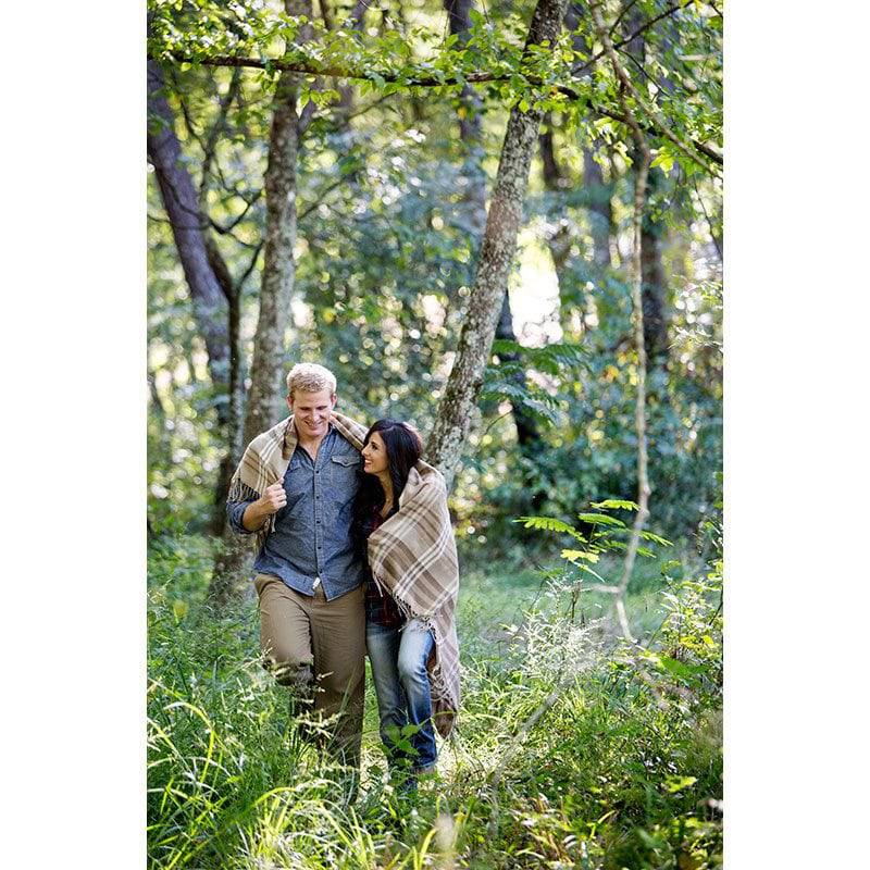 Collin Richie photography couple in woods engagement