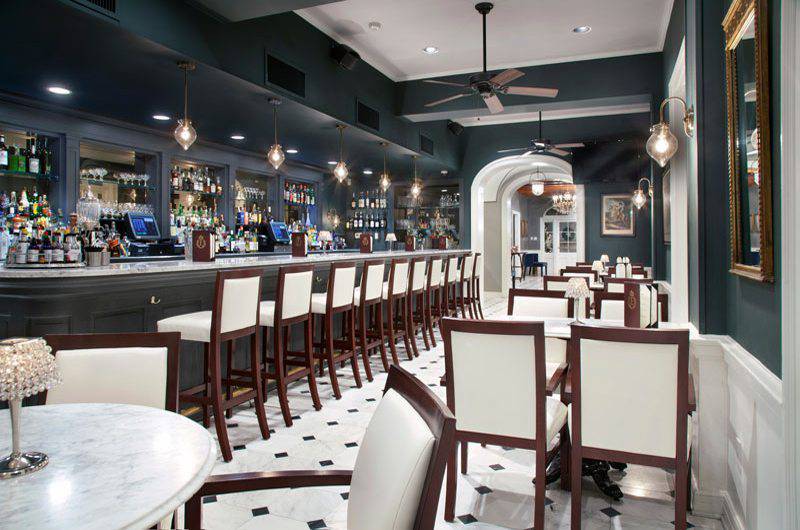 Broussards Restaurant and Courtyard Bar Room White tabletops